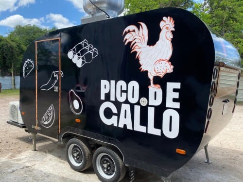 Custom Full Trailer Wrap applied to a food trailer for bold and professional branding.